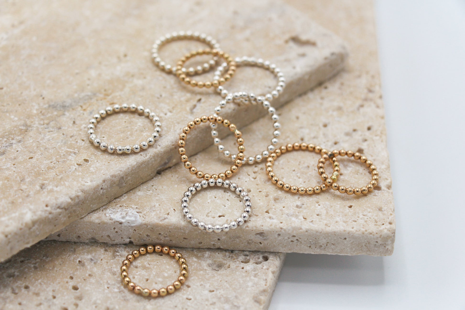 La Palla metal ball bead stacking ring band in sterling silver and 14k gold filled.