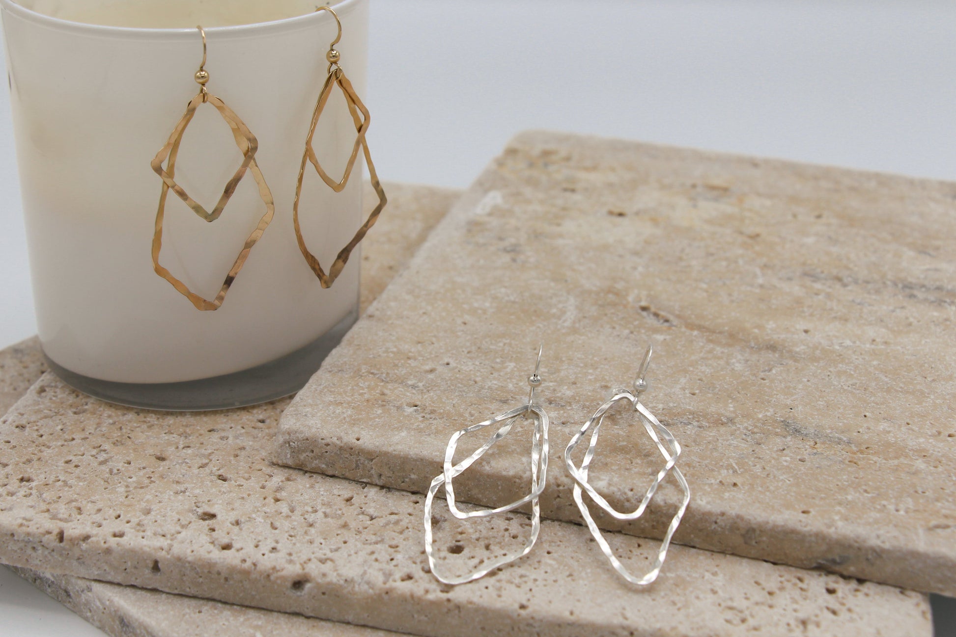 The Sierra Earrings feature hand-hammered double drops in gold or silver, inspired by mountain ridgelines. Lightweight, organic, and effortlessly elegant.
